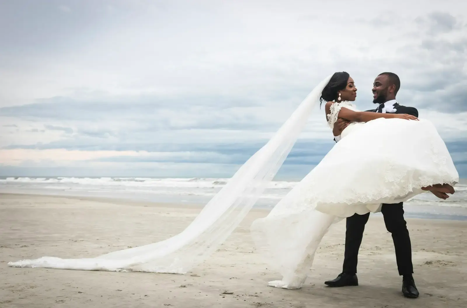 A couple on the beach in Aruba, planning their stay
