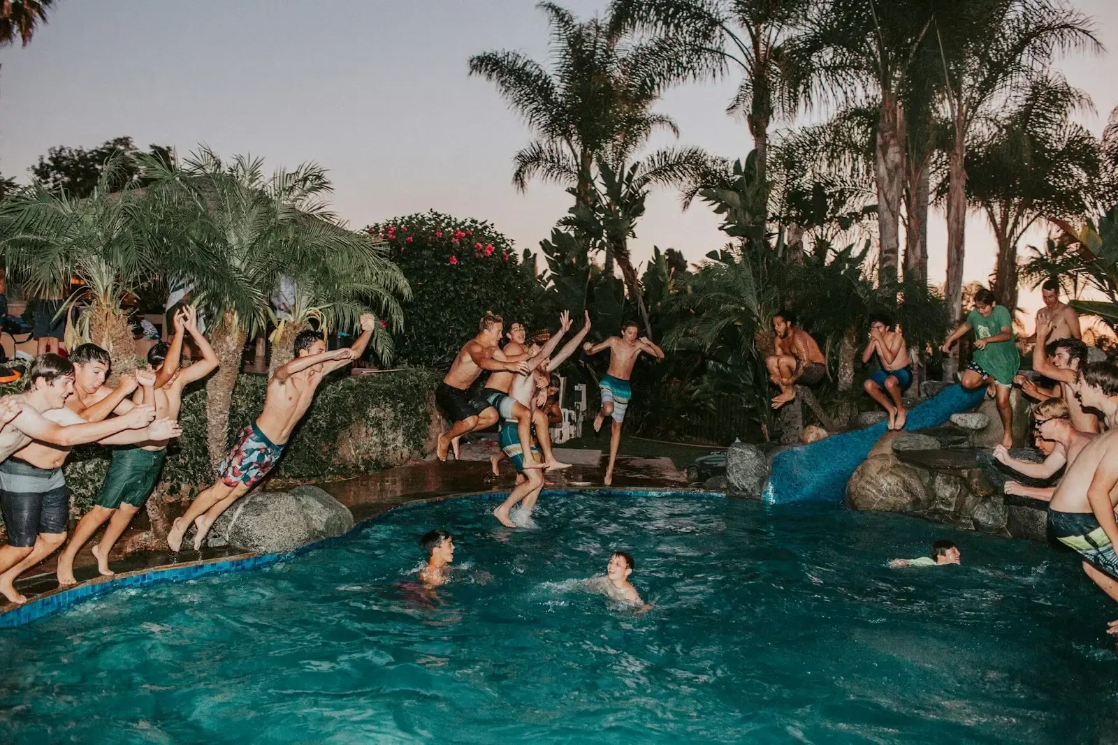 Guests relaxing at a resort pool in Aruba